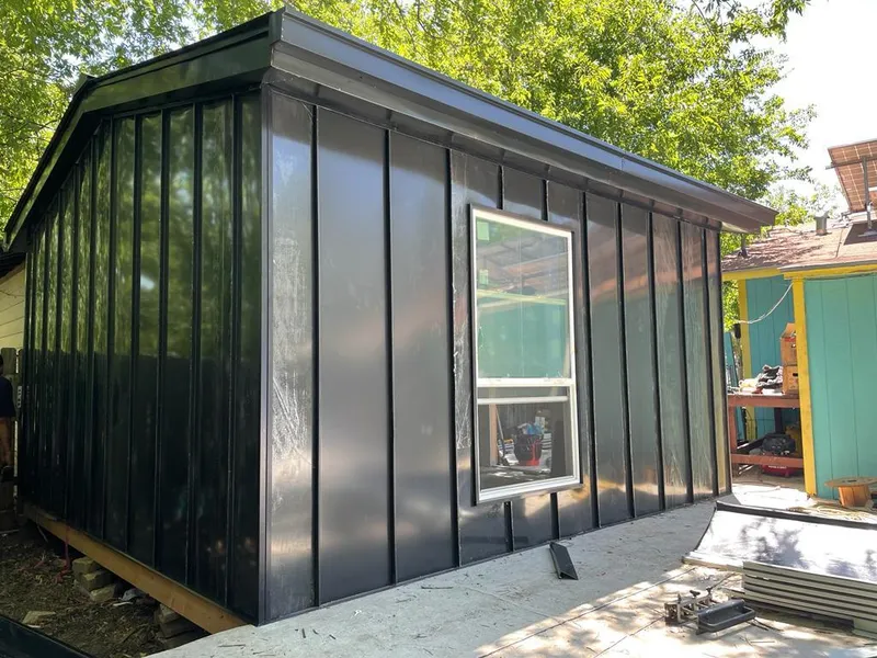 Black standing seam metal wall panels for Metal Roof Installation in Wharton