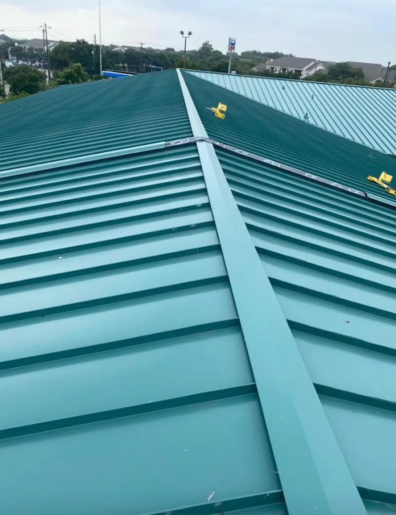 Green commercial metal roof ridge and valley for Metal Roof Repair in Wharton
